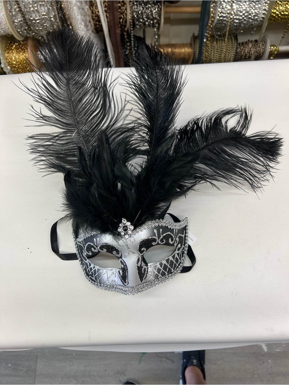 Black and Silver Feathered Masquerade Mask with Rhinestone Accent